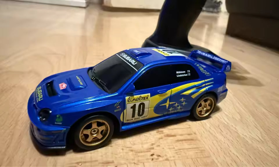 Officially Licensed Subaru WRX STI 4WD 1:43 Drift Car - Real photo 10