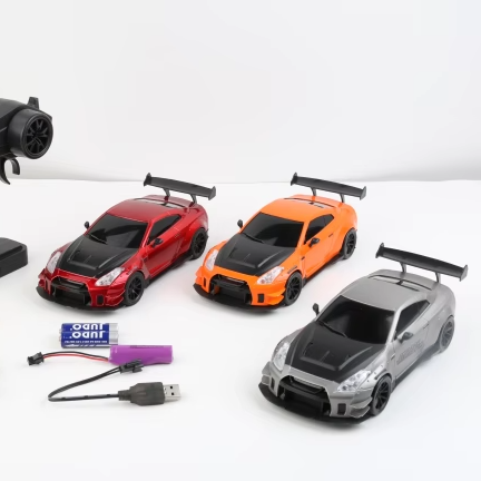 Set of remote control cars with accessories on a white background