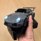 drift car and remote on hand
